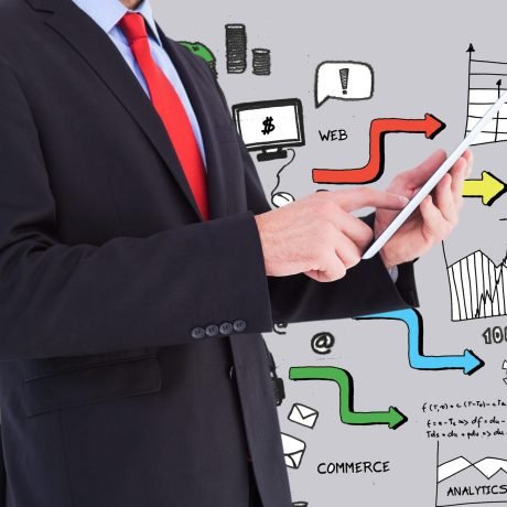 homme-d-affaires-elegante-avec-une-tablette-et-d-arriere-graphiques